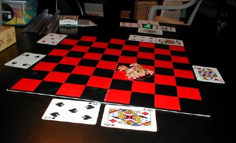 Trouble poses as the pawn.