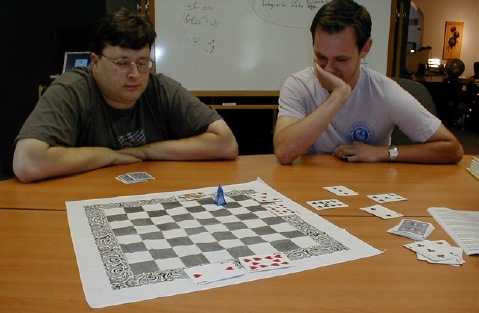 eray and chodacki study the board